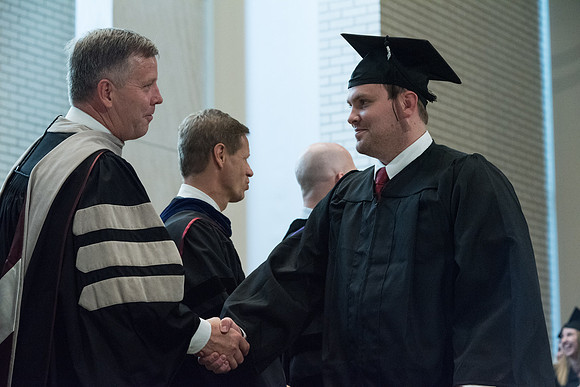 Awarding of Diplomas to graduates at the Home and Family Convocation in the Taylor Chapel.