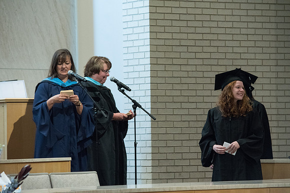 Awarding of Diplomas to graduates at the Home and Family Convocation in the Taylor Chapel.