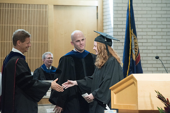 Awarding of Diplomas to graduates at the Home and Family Convocation in the Taylor Chapel.