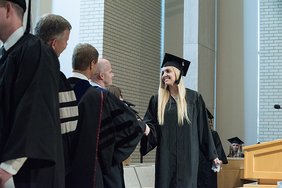 Awarding of Diplomas to graduates at the Home and Family Convocation in the Taylor Chapel.