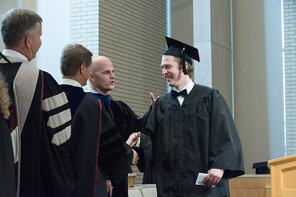 Awarding of Diplomas to graduates at the Home and Family Convocation in the Taylor Chapel.