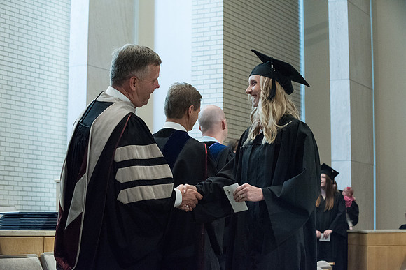 Awarding of Diplomas to graduates at the Home and Family Convocation in the Taylor Chapel.