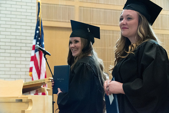 Awarding of Diplomas to graduates at the Home and Family Convocation in the Taylor Chapel.