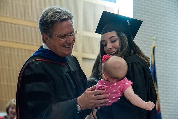 Awarding of Diplomas to graduates at the Home and Family Convocation in the Taylor Chapel.