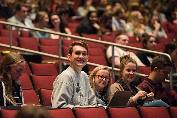 Students wait for devotional to start inside the BYU-Idaho Center.