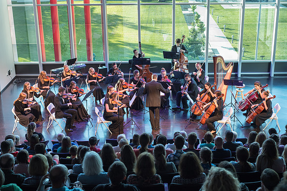 BYU-Idaho Orchestra made up of 24 talented musicians tours the Great Lakes region under direction of Dr. Dallin Hansen. Concert in Cedar Rapids, Iowa in the Whipple Auditorium, Public Library.