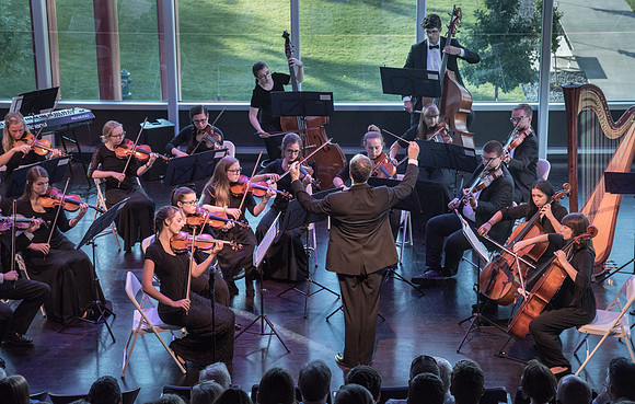 BYU-Idaho Orchestra made up of 24 talented musicians tours the Great Lakes region under direction of Dr. Dallin Hansen. Concert in Cedar Rapids, Iowa in the Whipple Auditorium, Public Library.