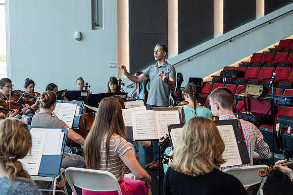 BYU-Idaho Orchestra made up of 24 talented musicians tours the Great Lakes region under direction of Dr. Dallin Hansen. Concert in Cedar Rapids, Iowa in the Whipple Auditorium, Public Library.