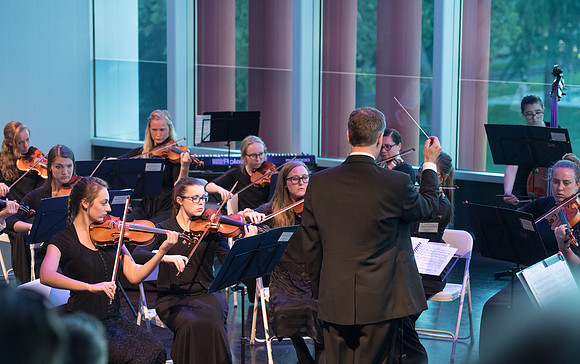 BYU-Idaho Orchestra made up of 24 talented musicians tours the Great Lakes region under direction of Dr. Dallin Hansen. Concert in Cedar Rapids, Iowa in the Whipple Auditorium, Public Library.