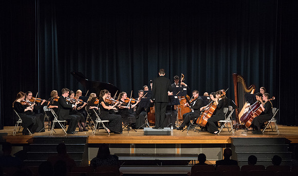 BYU-Idaho Orchestra made up of 24 talented musicians tours the Great Lakes region under direction of Dr. Dallin Hansen. Concert in Des Moines, Iowa at the Central Campus High School Auditorium.