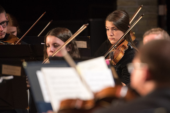 BYU-Idaho Orchestra made up of 24 talented musicians tours the Great Lakes region under direction of Dr. Dallin Hansen. Concert in Des Moines, Iowa at the Central Campus High School Auditorium.