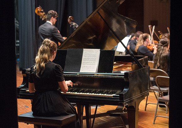 BYU-Idaho Orchestra made up of 24 talented musicians tours the Great Lakes region under direction of Dr. Dallin Hansen. Concert in Des Moines, Iowa at the Central Campus High School Auditorium.
