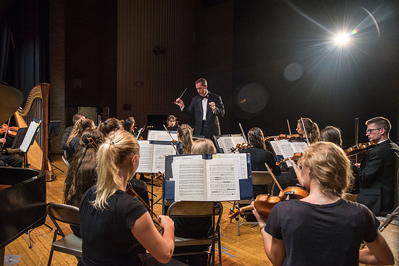 BYU-Idaho Orchestra made up of 24 talented musicians tours the Great Lakes region under direction of Dr. Dallin Hansen. Concert in Des Moines, Iowa at the Central Campus High School Auditorium.