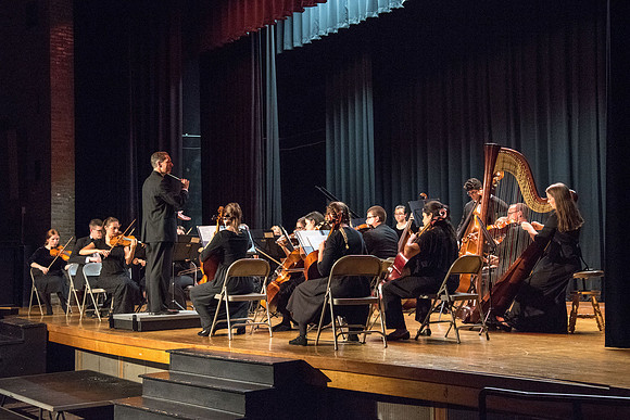 BYU-Idaho Orchestra made up of 24 talented musicians tours the Great Lakes region under direction of Dr. Dallin Hansen. Concert in Des Moines, Iowa at the Central Campus High School Auditorium.