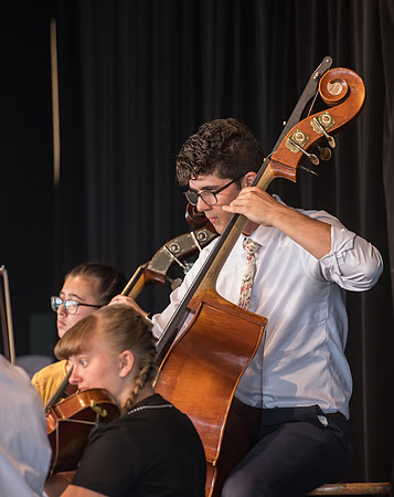BYU-Idaho Orchestra made up of 24 talented musicians tours the Great Lakes region under direction of Dr. Dallin Hansen. Concert at Como Park in St Paul Minnesota.