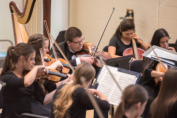 BYU-Idaho Orchestra made up of 24 talented musicians tours the Great Lakes region under direction of Dr. Dallin Hansen. Concert at University Wisconsin, Marshfield.