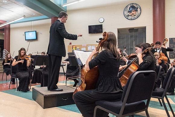 BYU-Idaho Orchestra made up of 24 talented musicians tours the Great Lakes region under direction of Dr. Dallin Hansen. Concert at University Wisconsin, Marshfield.