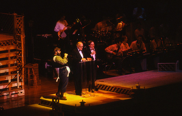 Gordon Jump, middle, and other theatre members perform on Centennial Spectacular Night.