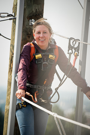 BYUI Students climbing around the ropes course by the upper fields in the summer of 2021.