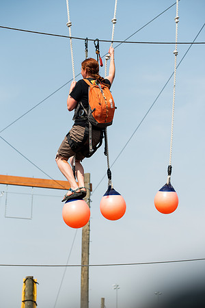 BYUI Students climbing around the ropes course by the upper fields in the summer of 2021.