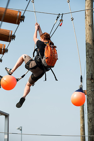 BYUI Students climbing around the ropes course by the upper fields in the summer of 2021.