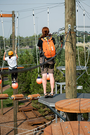 BYUI Students climbing around the ropes course by the upper fields in the summer of 2021.