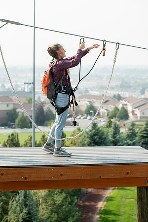 BYUI Students climbing around the ropes course by the upper fields in the summer of 2021.