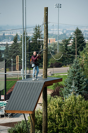 BYUI Students climbing around the ropes course by the upper fields in the summer of 2021.