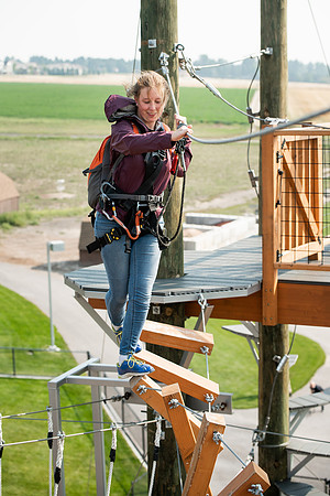 BYUI Students climbing around the ropes course by the upper fields in the summer of 2021.