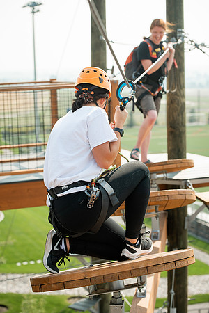 BYUI Students climbing around the ropes course by the upper fields in the summer of 2021.
