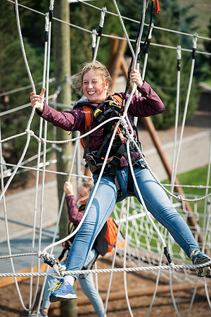 BYUI Students climbing around the ropes course by the upper fields in the summer of 2021.