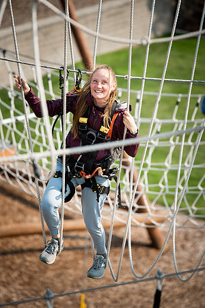 BYUI Students climbing around the ropes course by the upper fields in the summer of 2021.