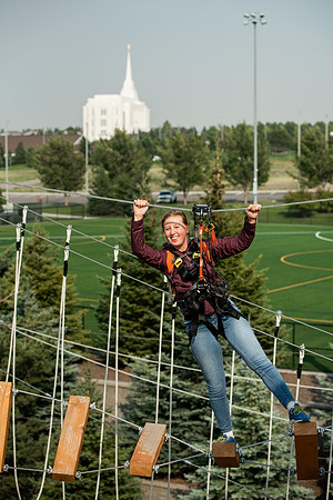 BYUI Students climbing around the ropes course by the upper fields in the summer of 2021.