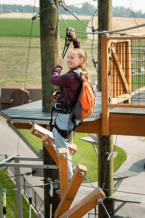 BYUI Students climbing around the ropes course by the upper fields in the summer of 2021.