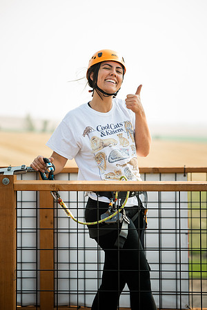 BYUI Students climbing around the ropes course by the upper fields in the summer of 2021.