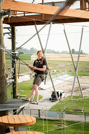 BYUI Students climbing around the ropes course by the upper fields in the summer of 2021.