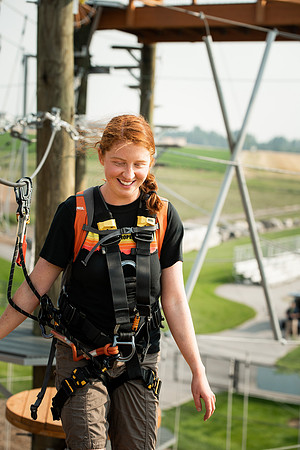 BYUI Students climbing around the ropes course by the upper fields in the summer of 2021.