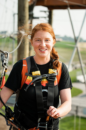 BYUI Students climbing around the ropes course by the upper fields in the summer of 2021.