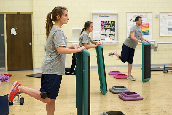Students exercise in the Power Shred fitness class sponsored by the Wellness Center.