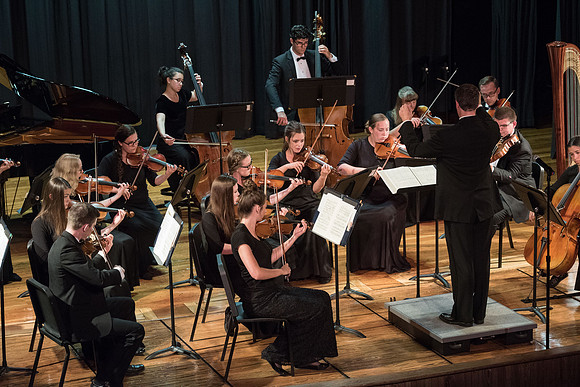 BYU-Idaho Orchestra made up of 24 talented musicians tours the Great Lakes region under direction of Dr. Dallin Hansen. Concert at Algoma Pefrorming Arts Center in Algoma, Wisconsin.