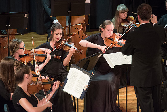 BYU-Idaho Orchestra made up of 24 talented musicians tours the Great Lakes region under direction of Dr. Dallin Hansen. Concert at Algoma Pefrorming Arts Center in Algoma, Wisconsin.