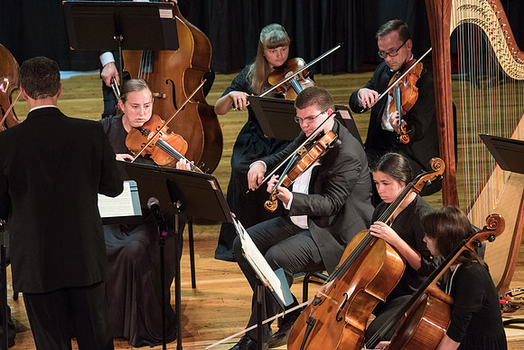 BYU-Idaho Orchestra made up of 24 talented musicians tours the Great Lakes region under direction of Dr. Dallin Hansen. Concert at Algoma Pefrorming Arts Center in Algoma, Wisconsin.