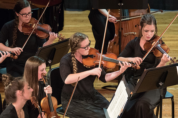BYU-Idaho Orchestra made up of 24 talented musicians tours the Great Lakes region under direction of Dr. Dallin Hansen. Concert at Algoma Pefrorming Arts Center in Algoma, Wisconsin.