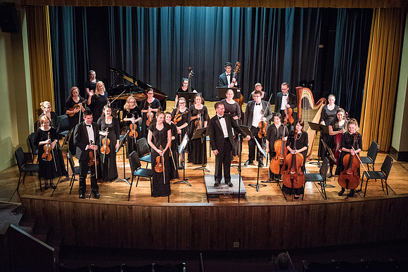 BYU-Idaho Orchestra made up of 24 talented musicians tours the Great Lakes region under direction of Dr. Dallin Hansen. Concert at Algoma Pefrorming Arts Center in Algoma, Wisconsin.