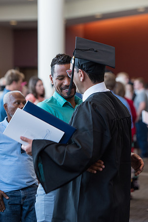 Graduates with their family and friends after the Commencement Service.