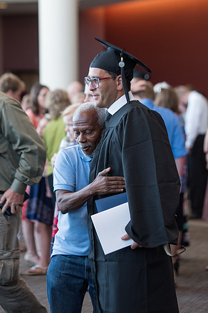 Graduates with their family and friends after the Commencement Service.