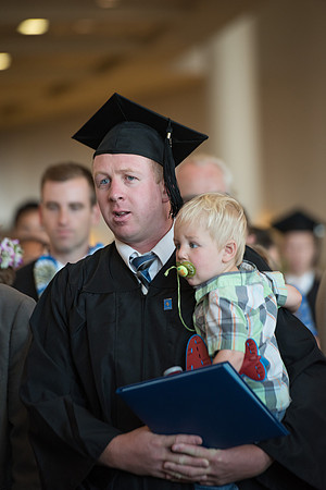 Graduates with their family and friends after the Commencement Service.