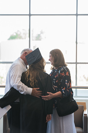 Graduates with their family and friends after the Commencement Service.