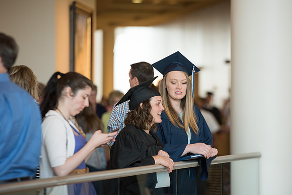 Graduates with their family and friends after the Commencement Service.