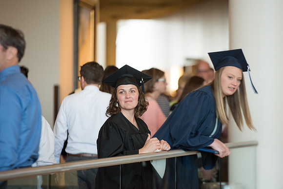 Graduates with their family and friends after the Commencement Service.